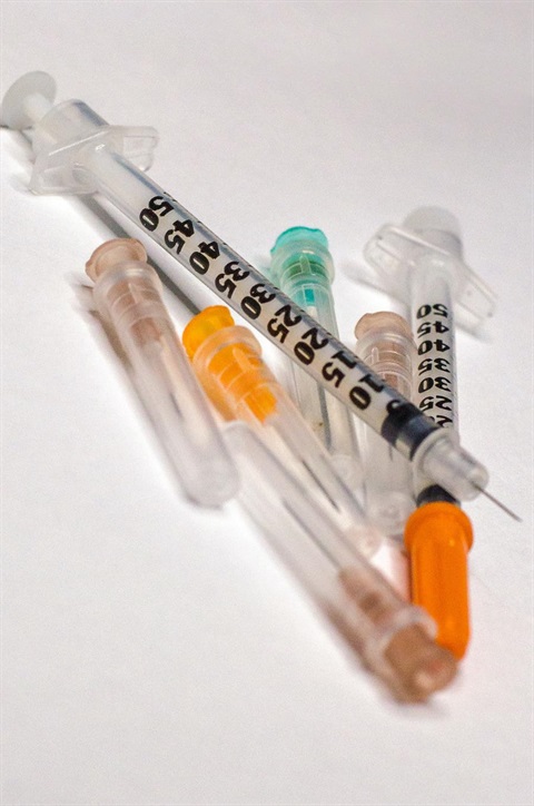 A small pile of syringes