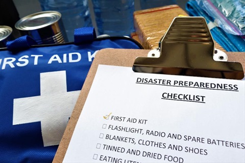 An emergency checklist and first aid kit.