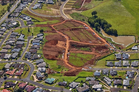 An aerial view of a subdivision being mapped out.