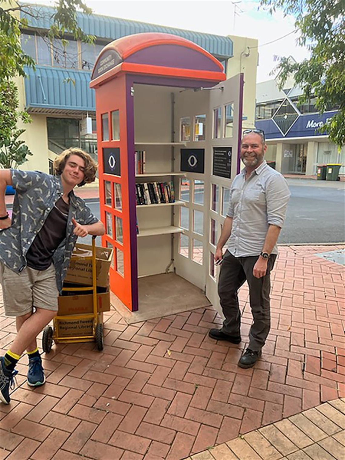 Two people outside Book Exchange