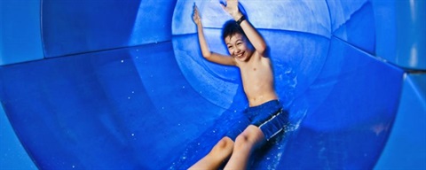 Child going down waterslide