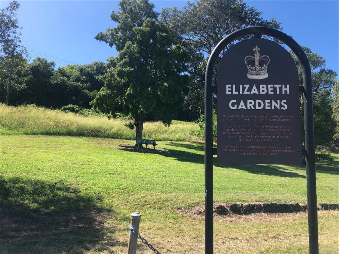 The sign and park bench at Elizabeth Gardens.