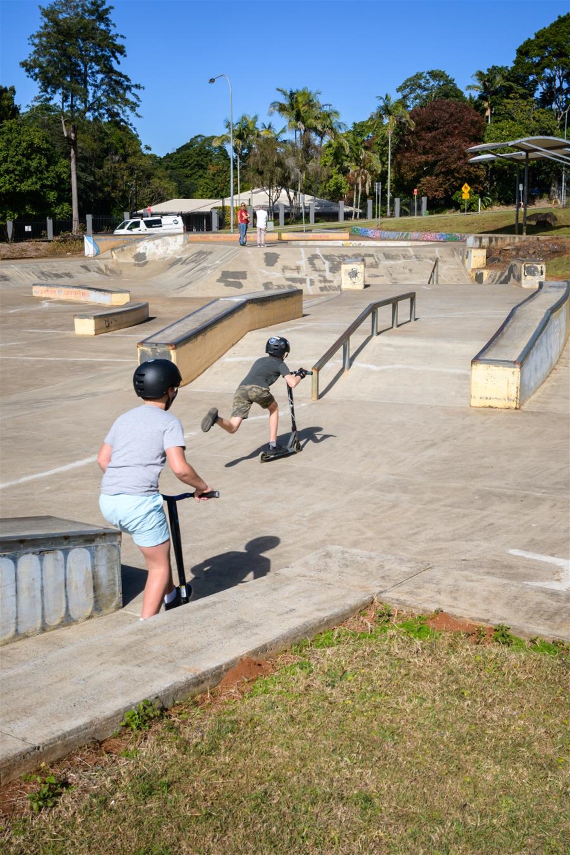 Kids on scooters at the Goonellabah Skate Park.