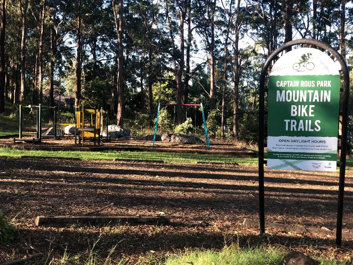 The sign and playground at Captain Rous Park, Goonellabah.