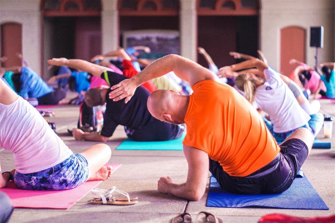 A group fitness yoga class.