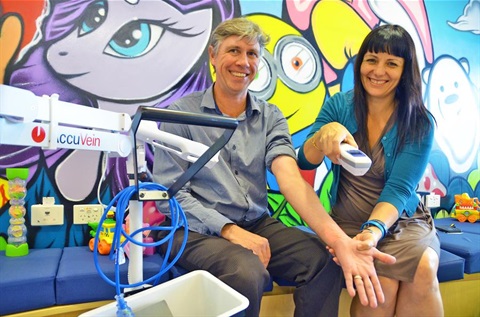 Donated medical equipment being handed over to a charity.