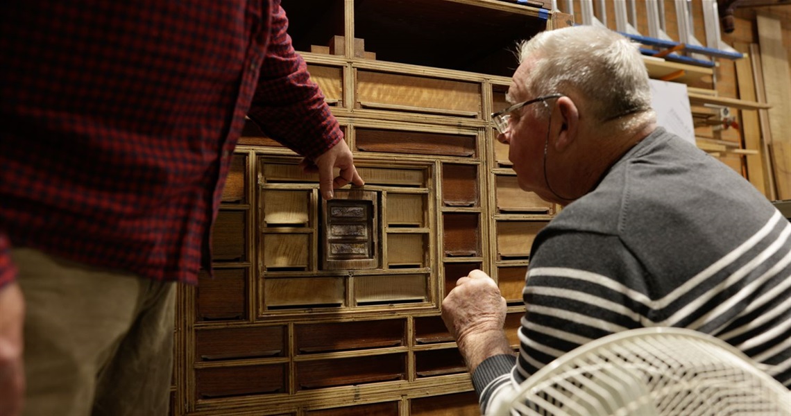 Geoff Hannah inspects the damage to the iconic Hannah Cabinet