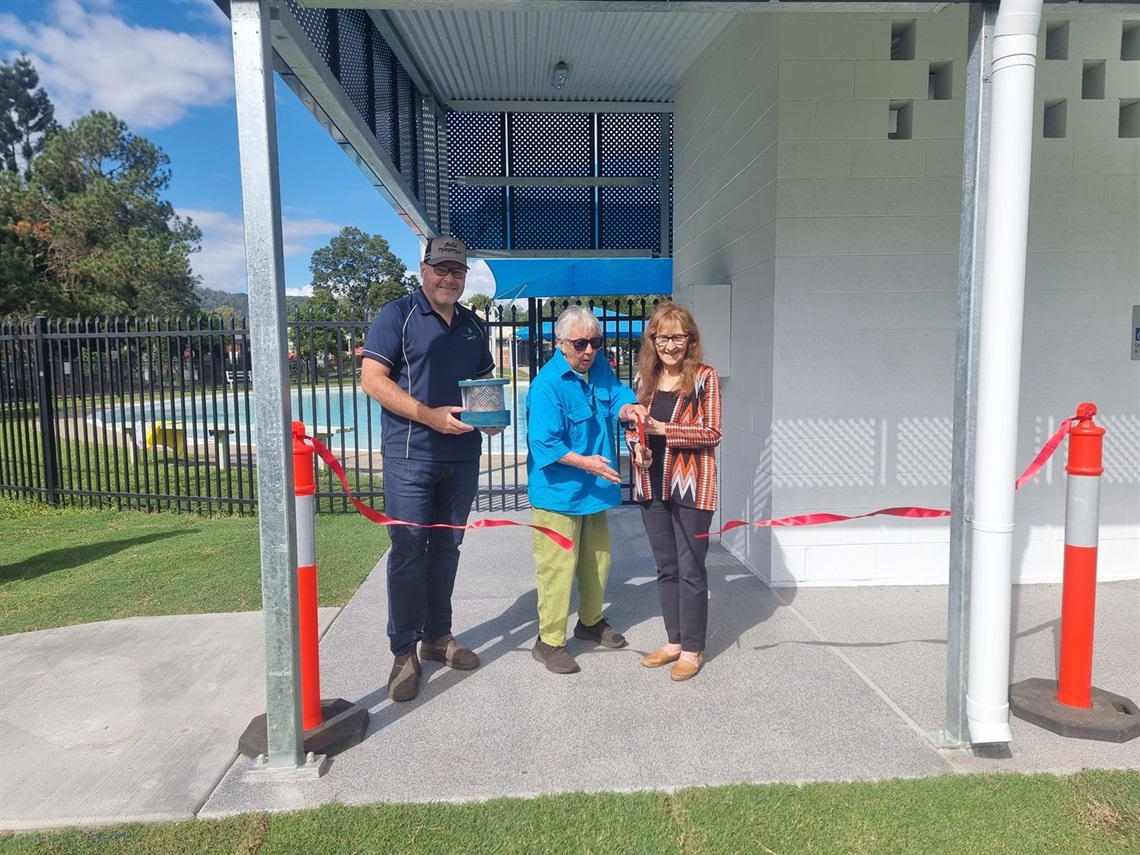 Mayor Steve Krieg, community member Sue Edmonds and Member for Lismore Janelle Saffin open the long-awaited toilets at Nimbin's Peace Park