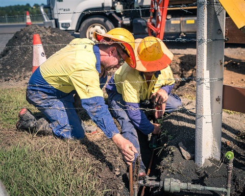 water crew fixing water meter.jpg
