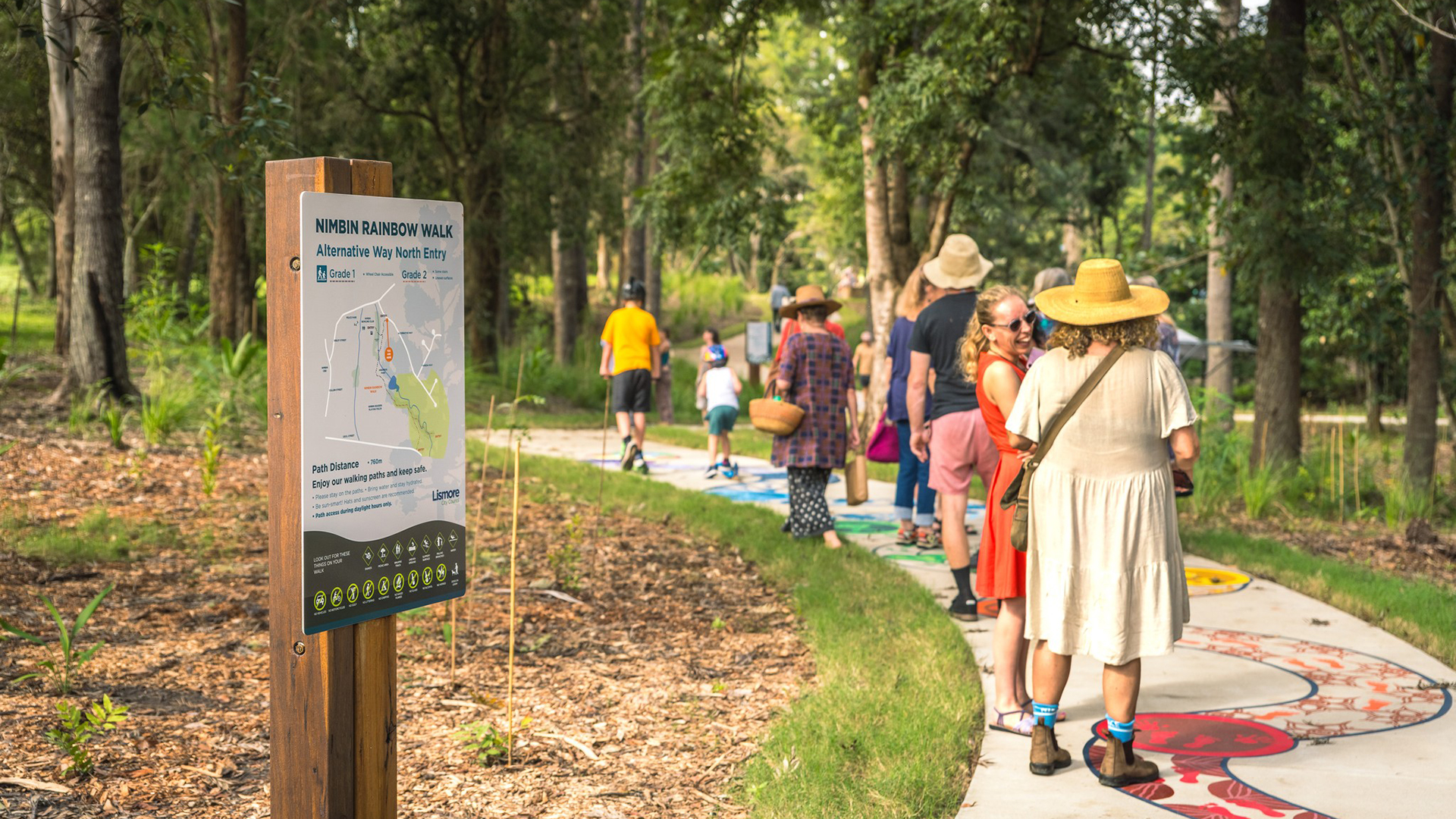 Families on the Nimbin Rainbow Walk.