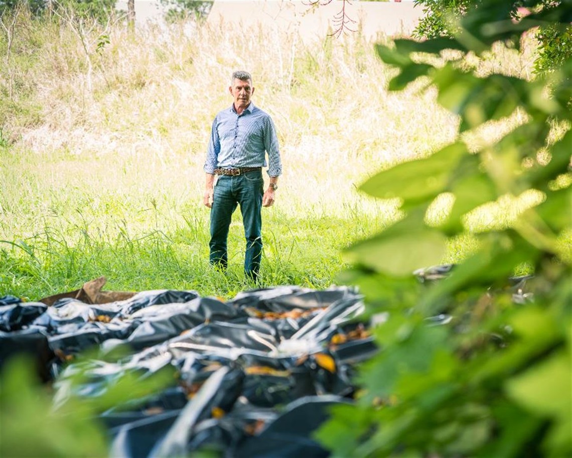 Lismore City Council Regulatory Services Officer Stuart Thomson investigating illegally dumped asbestos.