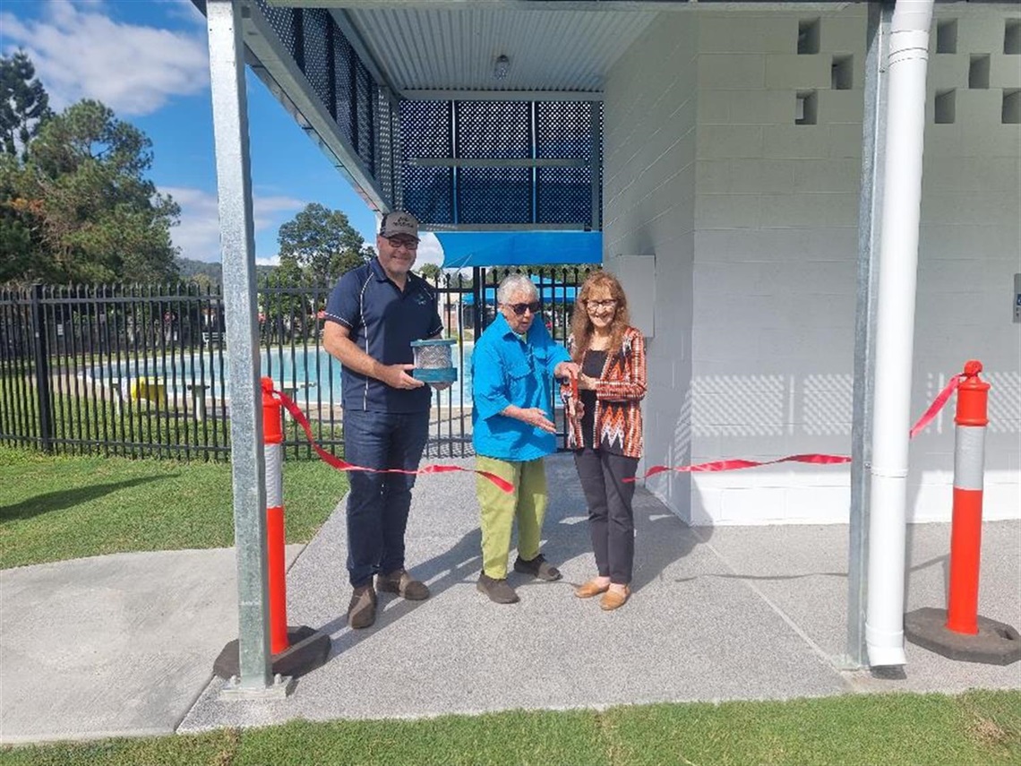 Mayor Steve Krieg, community member Sue Edmonds and Member for Lismore Janelle Saffin open the long-awaited toilets at Nimbin's Peace Park