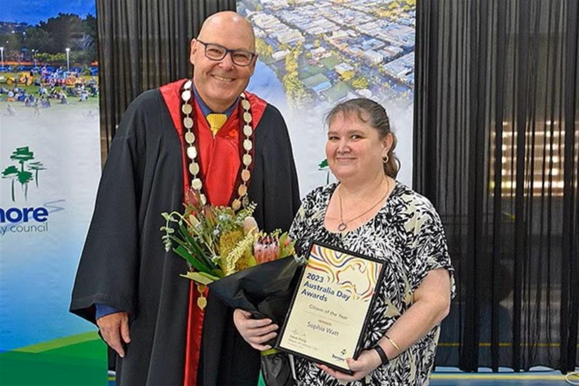 Mayor Steve Krieg with 2023 Citizen of the Year Sophia Watt.